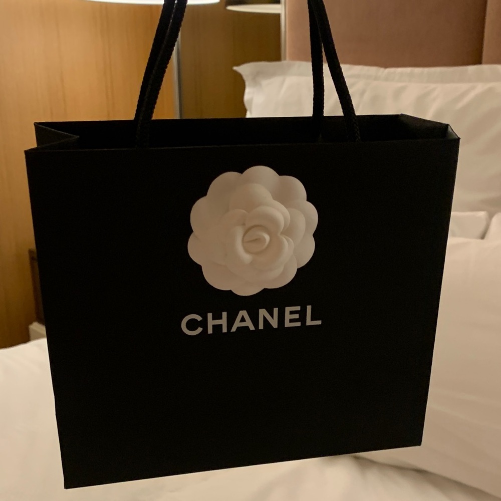 Authentic rare/collectible Chanel paper bag with white camellia ,medium size